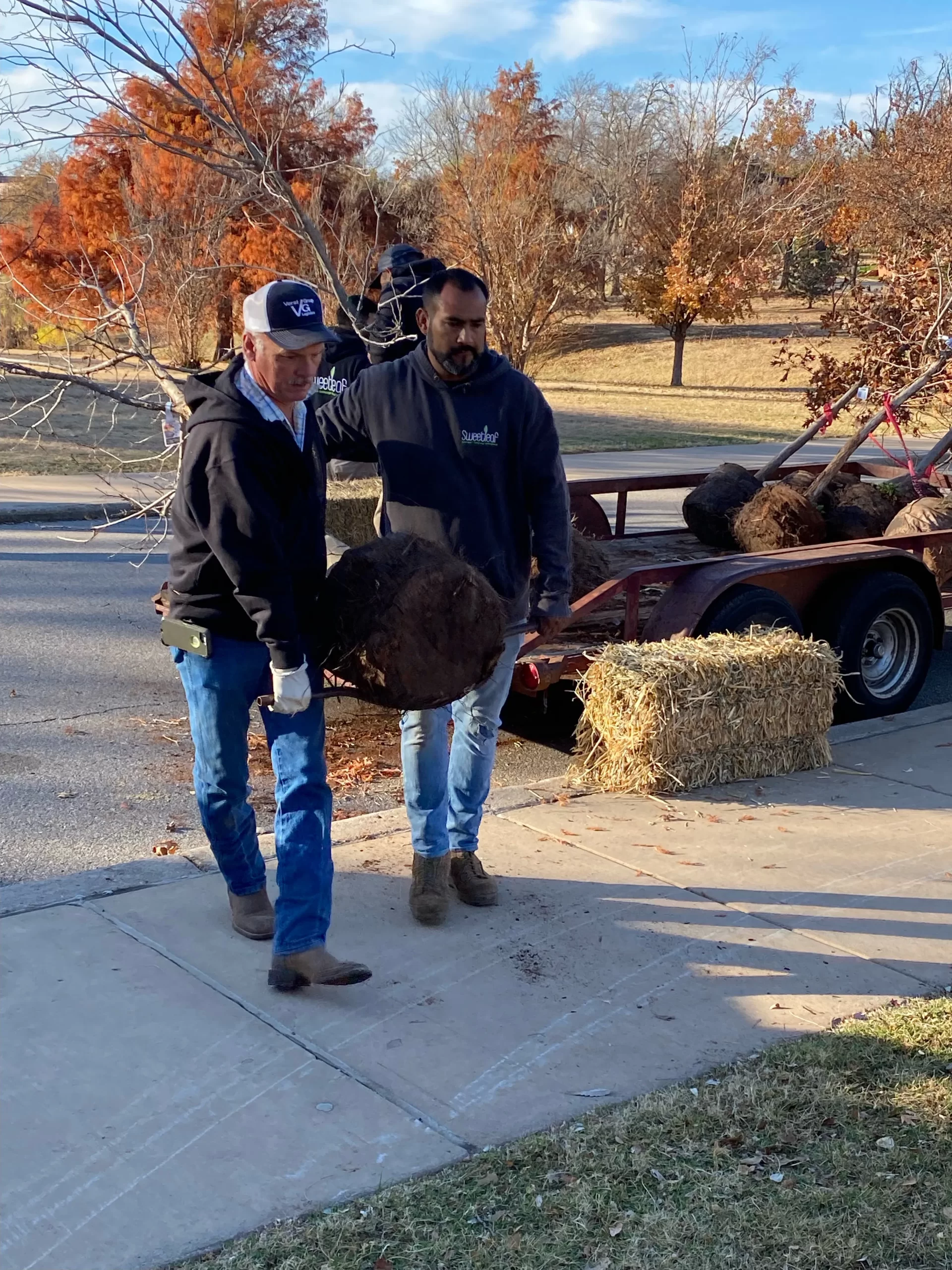 Volunteers planting trees in Oklahoma City neighborhood park
