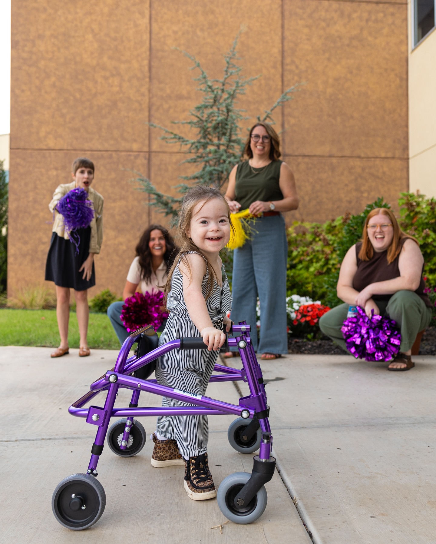 Little girl experiences her walker for the first time.