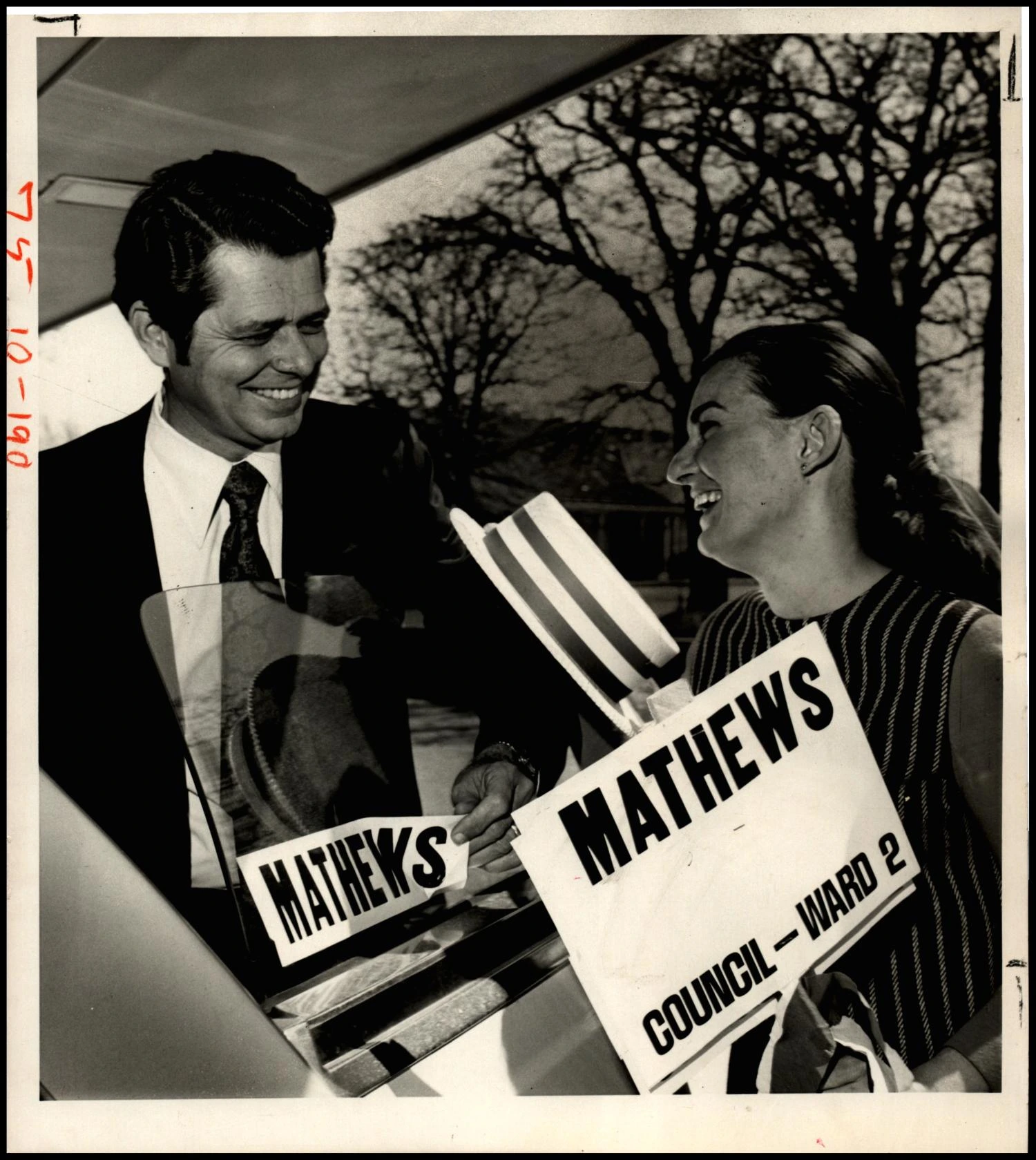 Councilman-elect Eugene Mathews and his wife, Doli, clear out campaign materials after victory.